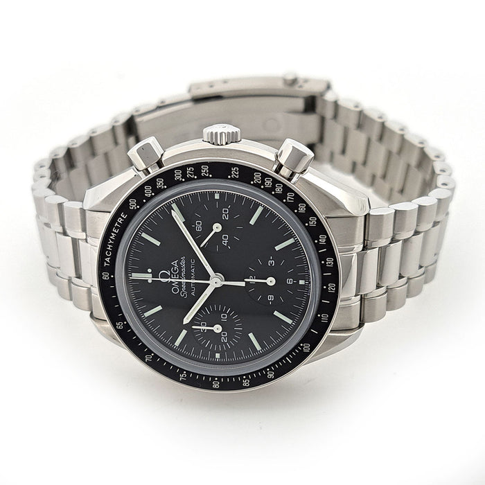 OMEGA 
Speedmaster Overhauled 
Includes box and papers