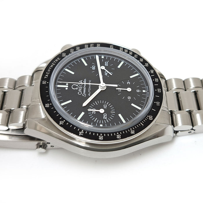 OMEGA 
Speedmaster Overhauled 
Includes box and papers