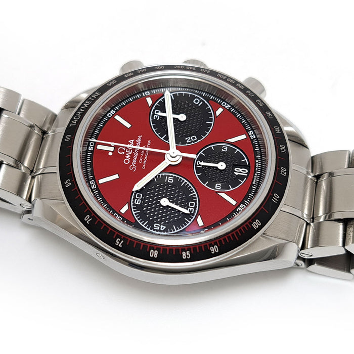 OMEGA 
Speedmaster Racing 
Avec boîte et papiers