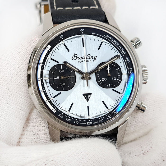 BREITLING 
Top Time Triumph 
Avec boîte et papiers