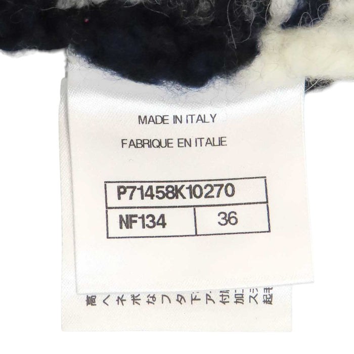 CHANEL 
COCO CC Coco buttons cashmere wool alpaca 
Coco Mark striped knit