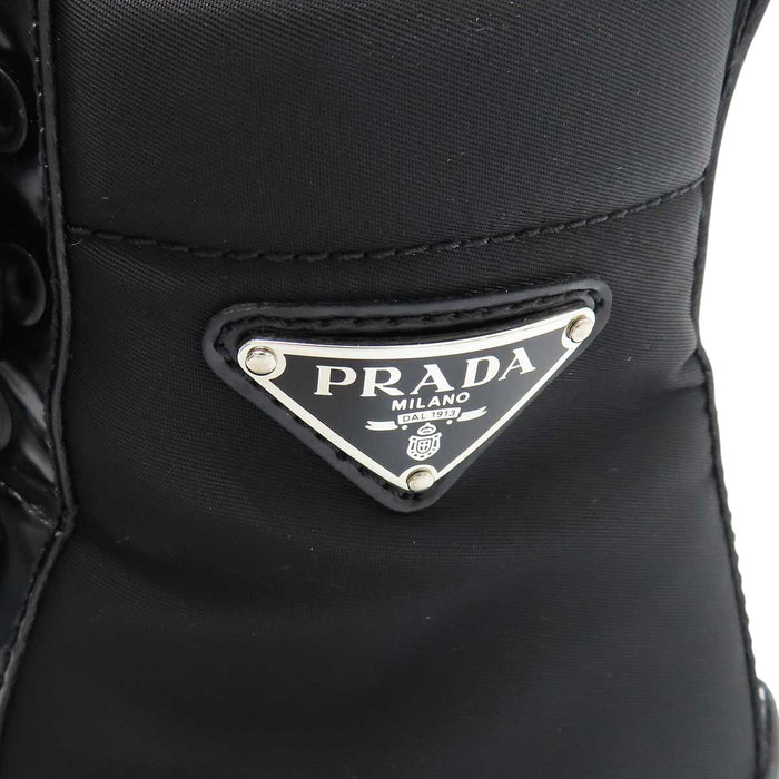 PRADA 
三角ロゴ レザー ヒール Re-Nylon 
トライアングル レースアップ ショートブーツ