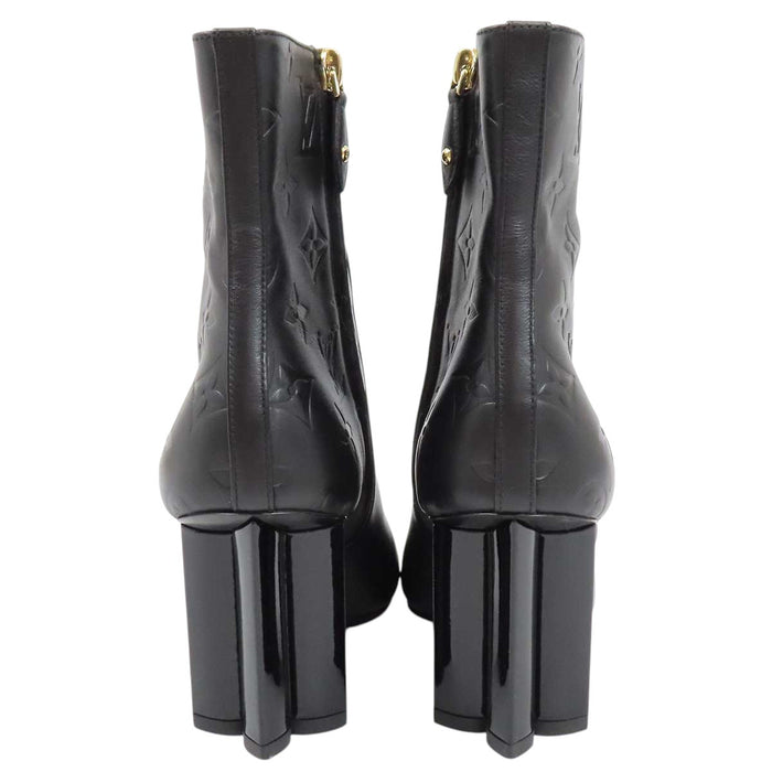 LOUIS VUITTON 
2023 LV Logo Side-Zip High-Heel 
Silhouette Line Leather Ankle Boots 
Monogram