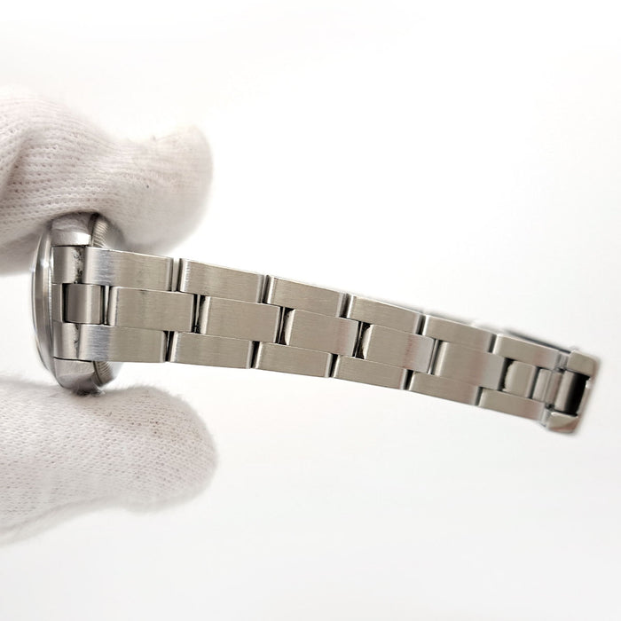 ROLEX 
Oyster Perpetual 
avec boîte et papiers