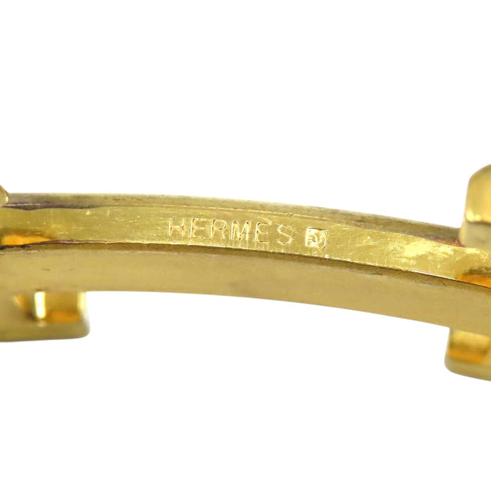 HERMES 
Ash Logo Gold-Tone Metal 
H Buckle