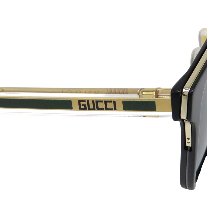 GUCCI 
Eyewear Wellington Clear 
Logo Temple Sunglasses