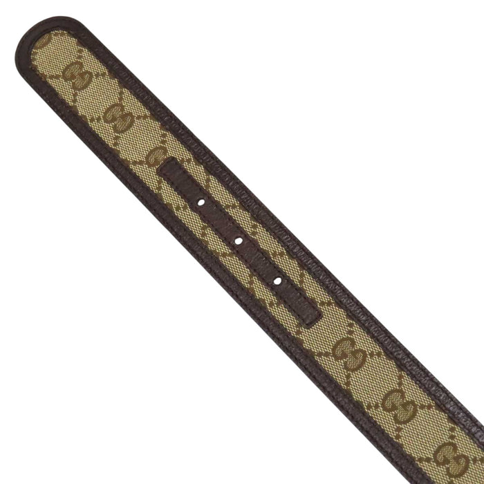 GUCCI 
Logo silver-tone metal 
Interlocking G buckle GG canvas leather belt