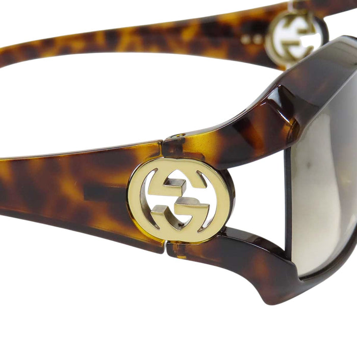 GUCCI 
Eyewear logo gold-tone metal 
Interlocking G sunglasses