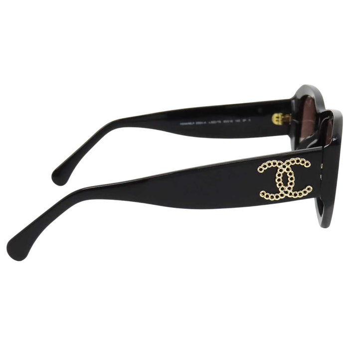 CHANEL 
COCO CC logo eyewear in gold-tone metal 
Coco Mark rectangular sunglasses