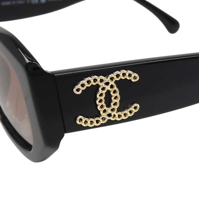 CHANEL 
COCO CC logo eyewear in gold-tone metal 
Coco Mark rectangular sunglasses