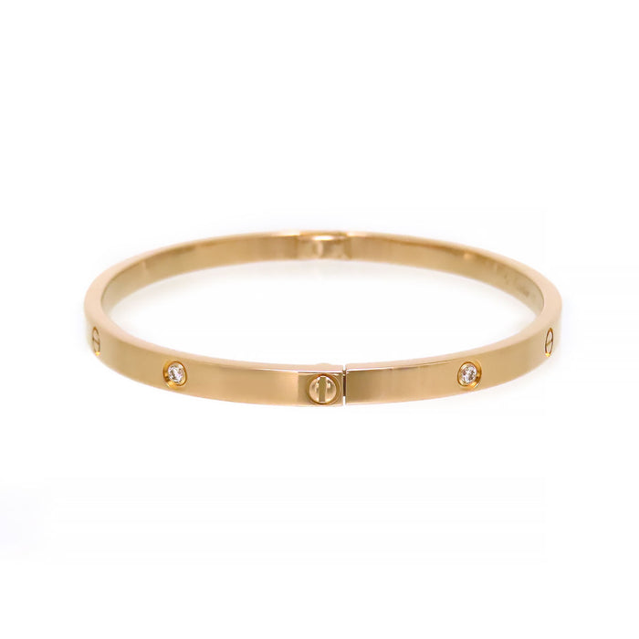 CARTIER 
Bracelet LOVE SM, demi-pavé de diamants