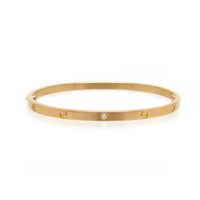 CARTIER 
Bracelet LOVE SM, demi-pavé de diamants