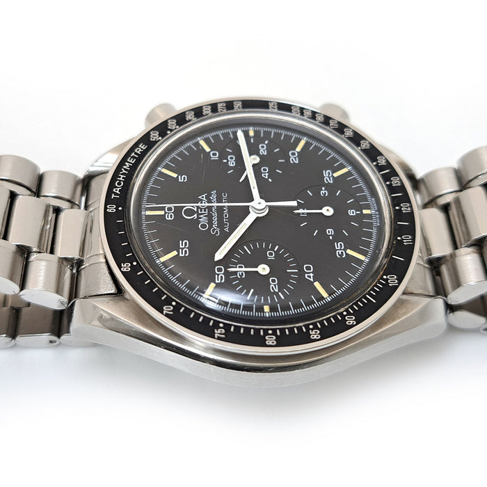 OMEGA 
Speedmaster Reduced 
With box and papers
