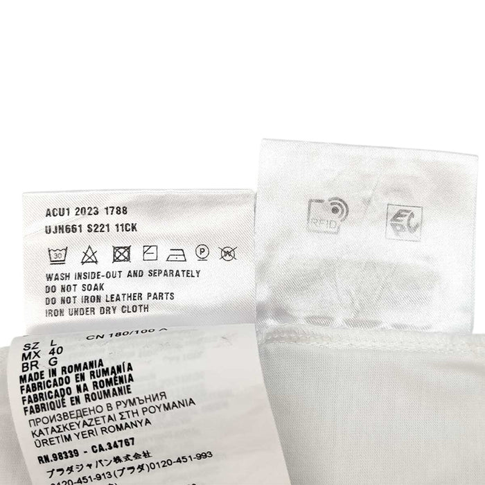 PRADA 
Cotton Re-Nylon Contrast Panel 
Triangle Logo Cotton Nylon T-Shirt