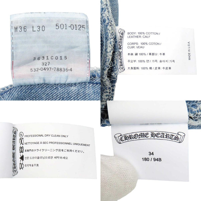 CHROME HEARTS 
CH Levi's 501 distressed-finish cross-patch scroll-label 
galaxy-patch denim pants, Saint Barth limited edition