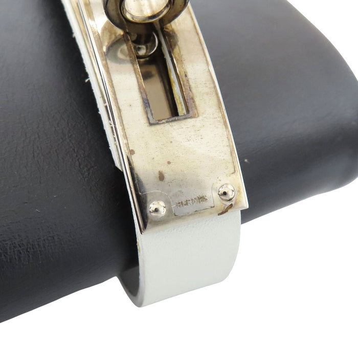 HERMES 
Kelly buckle leather long 
jumping boots