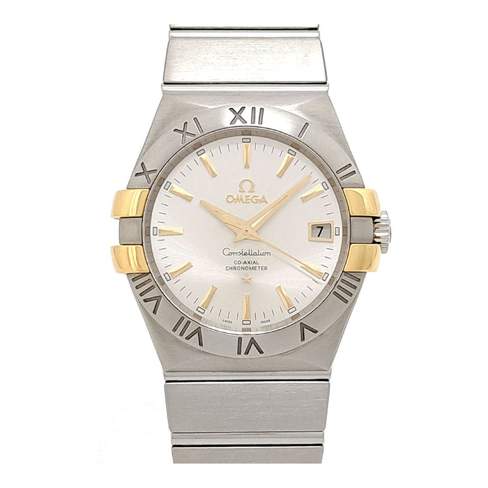 OMEGA 
Constellation Co-Axial 
With box and papers