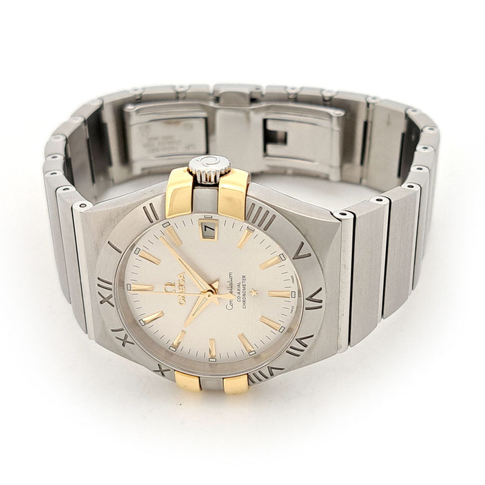 OMEGA 
Constellation Co-Axial 
With box and papers