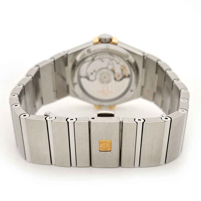 OMEGA 
Constellation Co-Axial 
With box and papers