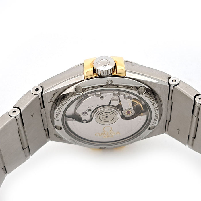 OMEGA 
Constellation Co-Axial 
With box and papers