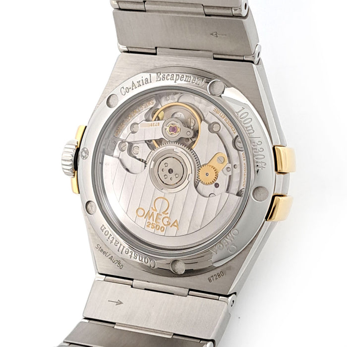 OMEGA 
Constellation Co-Axial 
With box and papers