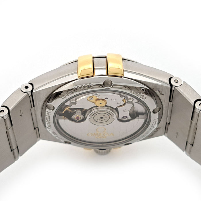 OMEGA 
Constellation Co-Axial 
With box and papers