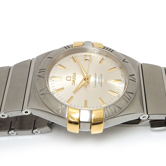 OMEGA 
Constellation Co-Axial 
With box and papers