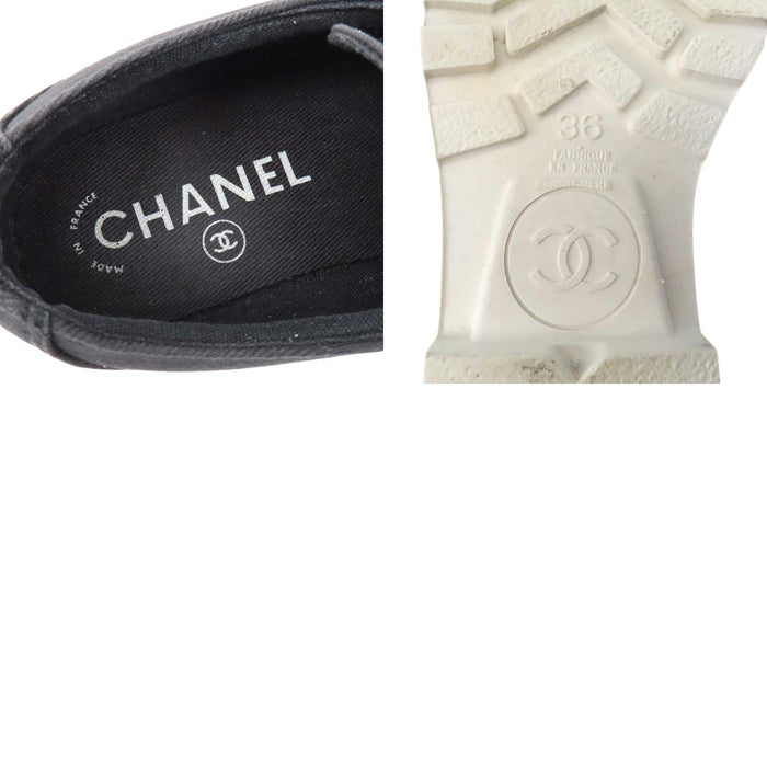 CHANEL 
COCO CC Logo Embroidered Lace-Up 
Coco Mark Canvas Sneakers
