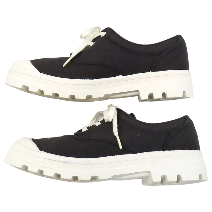 CHANEL 
COCO CC Logo Embroidered Lace-Up 
Coco Mark Canvas Sneakers