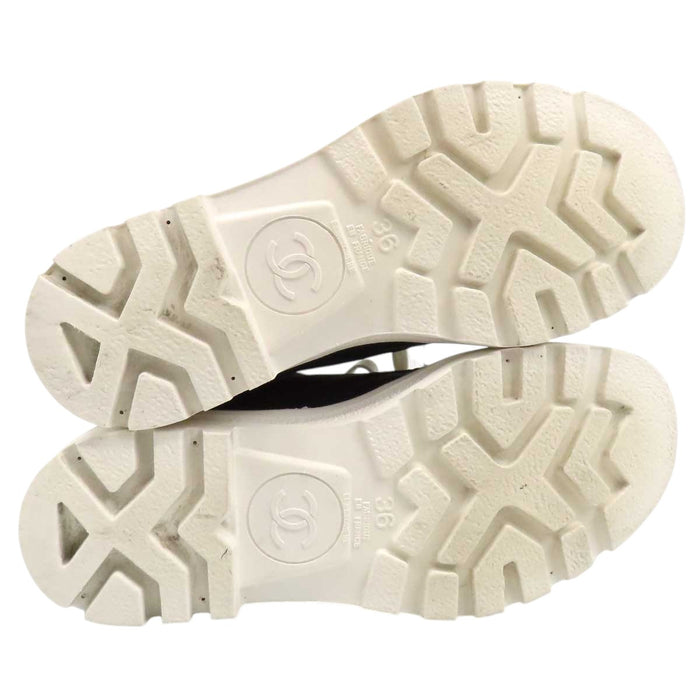 CHANEL 
COCO CC Logo Embroidered Lace-Up 
Coco Mark Canvas Sneakers