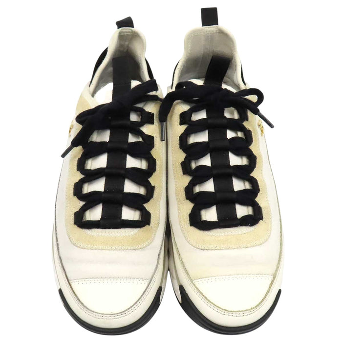 CHANEL 
COCO CC logo gold-tone metal lace-up 
Coco Mark leather fabric sneakers