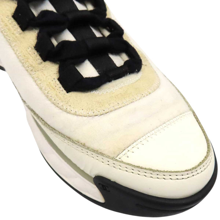 CHANEL 
COCO CC logo gold-tone metal lace-up 
Coco Mark leather fabric sneakers