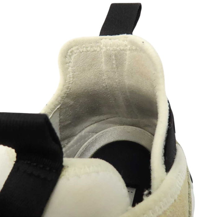 CHANEL 
COCO CC logo gold-tone metal lace-up 
Coco Mark leather fabric sneakers
