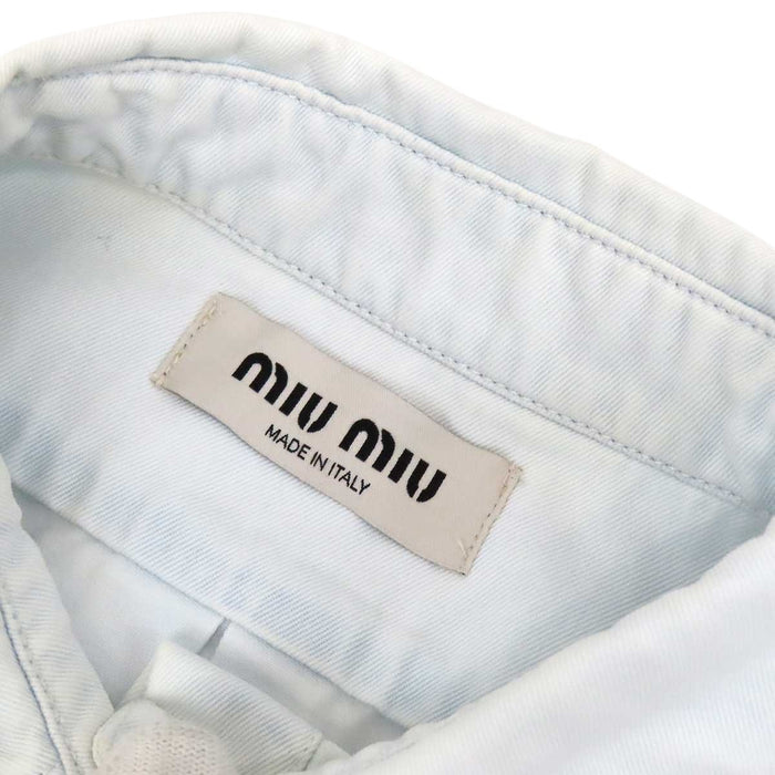 MIUMIU 
Logo raw-edge cotton long-sleeve 
Cropped denim shirt