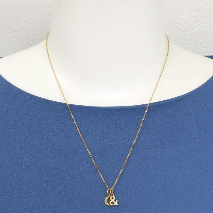 TIFFANY&Co. 
Ampersand Moon Necklace
