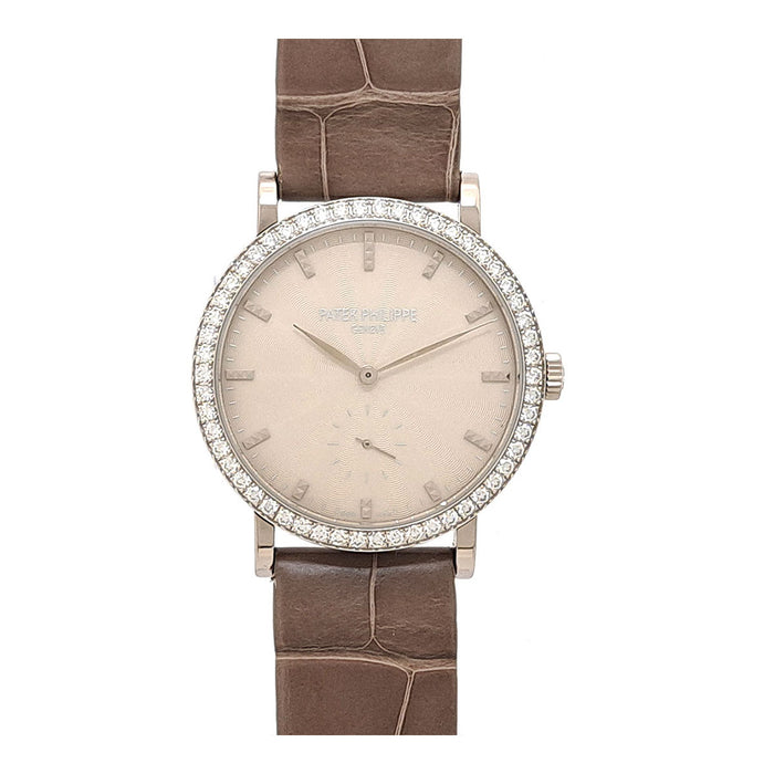 PATEK PHILIPPE 
Calatrava with diamond bezel 
With papers