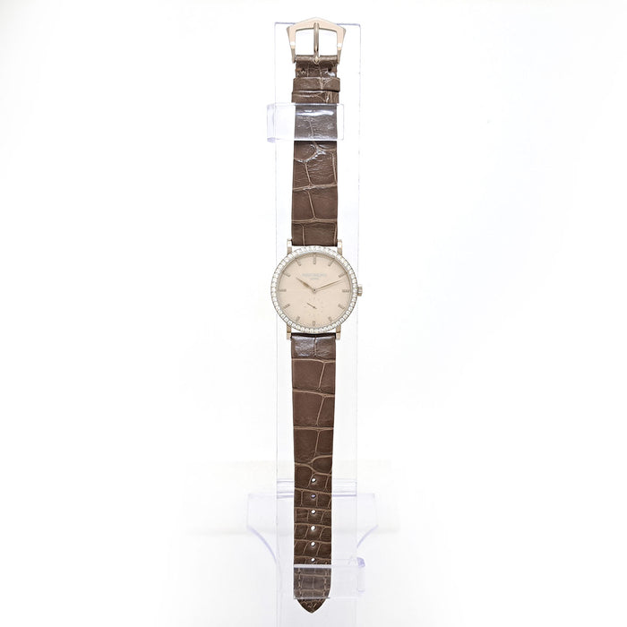 PATEK PHILIPPE 
Calatrava with diamond bezel 
With papers