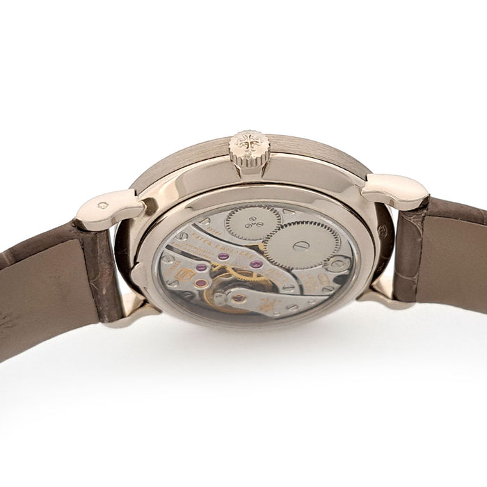 PATEK PHILIPPE 
Calatrava with diamond bezel 
With papers