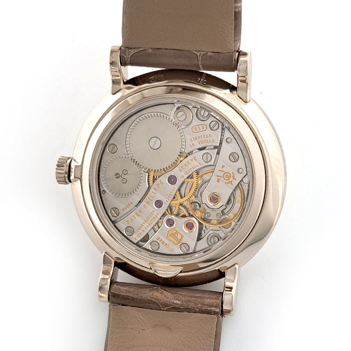 PATEK PHILIPPE 
Calatrava with diamond bezel 
With papers