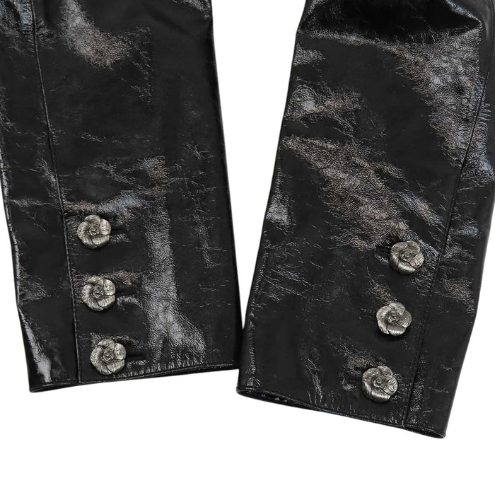 CHANEL 
COCO CC camellia calfskin Coco button 
Coco logo leather coat