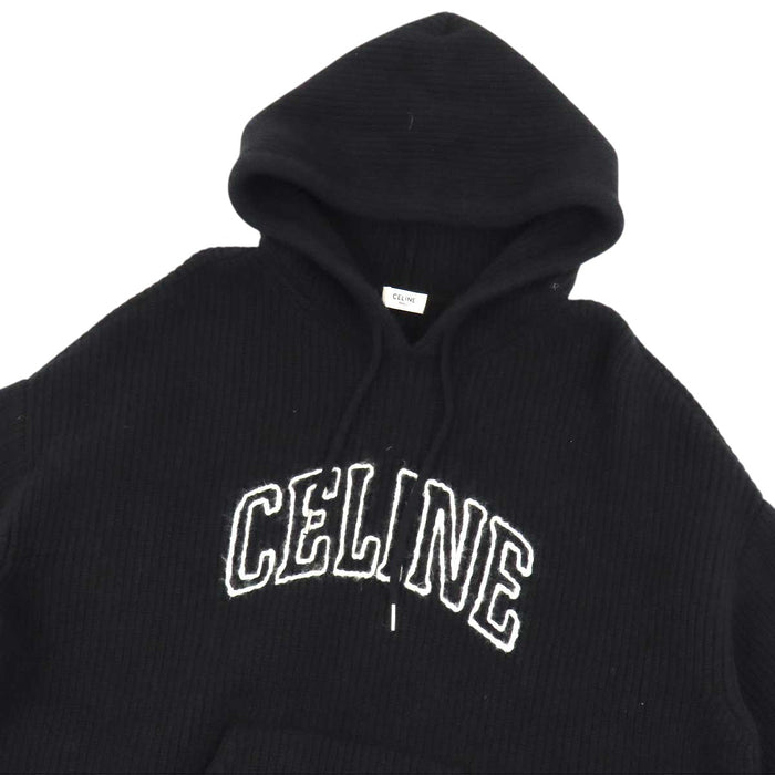 CELINE 
Pull à capuche en laine 
à logo