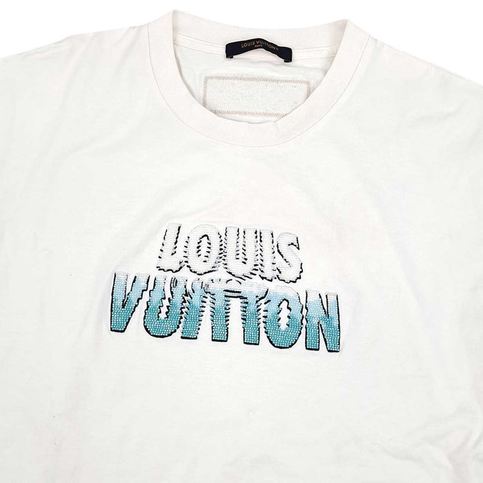 LOUIS VUITTON 
T-shirt en coton à col rond, logo LV réversible, broderie de perles