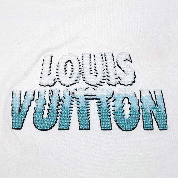 LOUIS VUITTON 
T-shirt en coton à col rond, logo LV réversible, broderie de perles