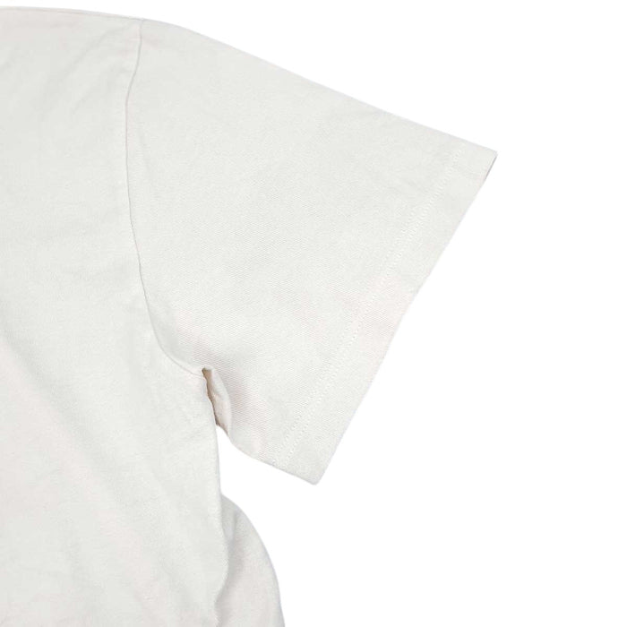 LOUIS VUITTON 
T-shirt en coton à col rond, logo LV réversible, broderie de perles