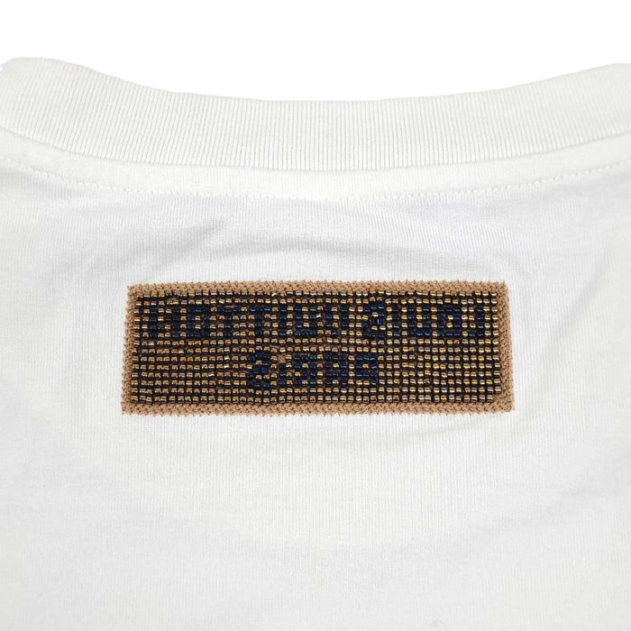 LOUIS VUITTON 
T-shirt en coton à col rond, logo LV réversible, broderie de perles