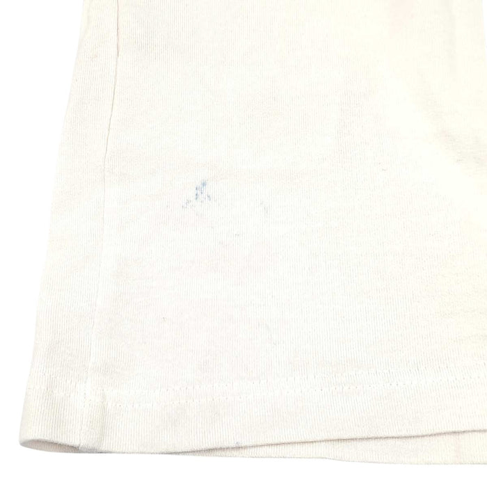 LOUIS VUITTON 
T-shirt en coton à col rond, logo LV réversible, broderie de perles
