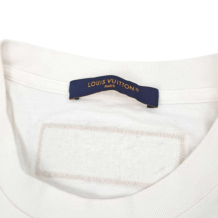 LOUIS VUITTON 
T-shirt en coton à col rond, logo LV réversible, broderie de perles