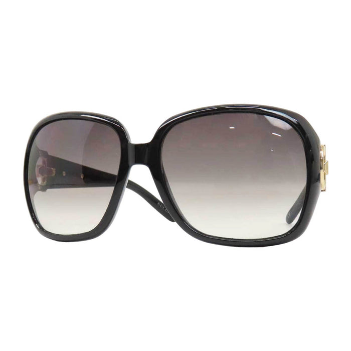 GUCCI 
Logo, métal doré, lentilles dégradées 
Lunettes avec mors de cheval