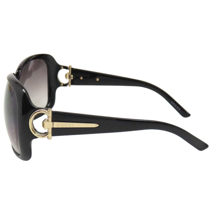 GUCCI 
Logo, métal doré, lentilles dégradées 
Lunettes avec mors de cheval