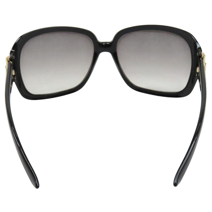 GUCCI 
Logo, métal doré, lentilles dégradées 
Lunettes avec mors de cheval